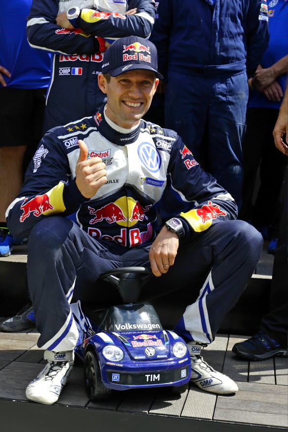 Sébastien Ogier med en rallybil till nästa generation mästare.